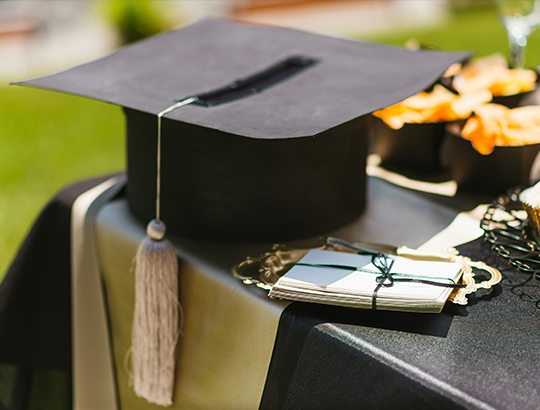 Graduation cap on table