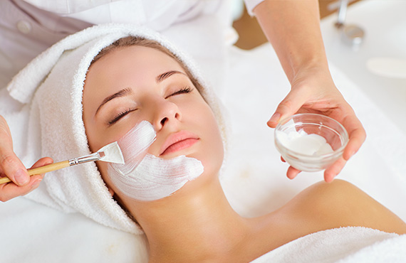 Woman receiving a spa facial