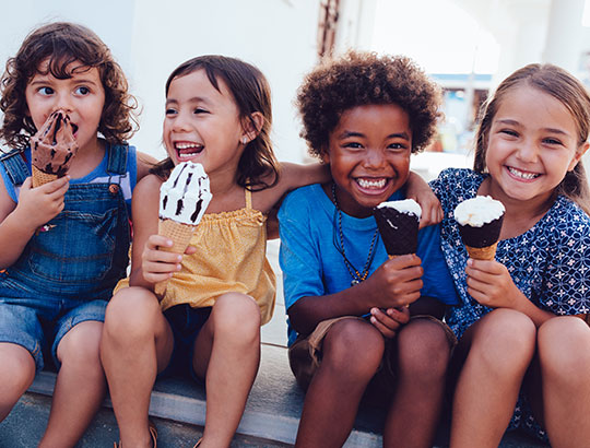 Group of kids enjoying ice cream on Mission Bay
