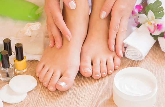 Woman enjoying a pedicure at the Catamaran Spa