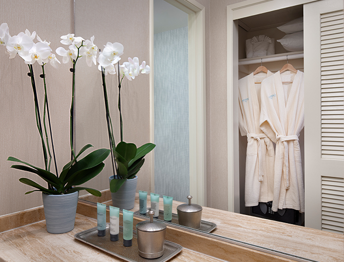 Bathroom dressing area with robes