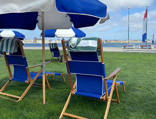 Beach chairs and umbrellas overlooking Mission Bay