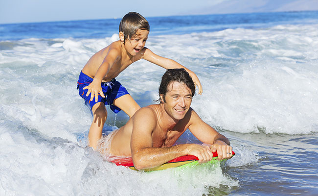 Surf's Up a favorite San Diego activities for social distancing on your vacation