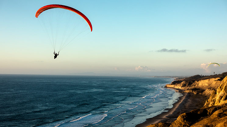 Paragliding over the cliffs of Torrey Pines on your San Diego staycation
