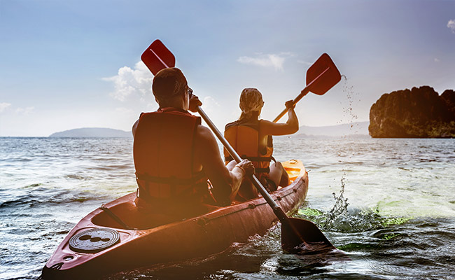 Kayaking from the shores of Mission Bay at the Catamaran Resort Hotel by Pacific Beach, San Diego, CA