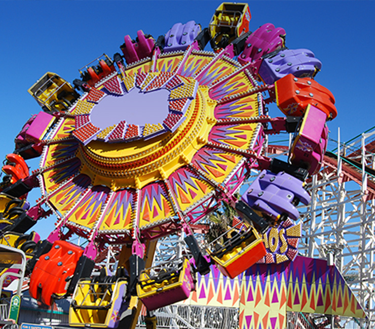 Power forward, backward and upside down while rotating around on the Control Freak ride at San Diego’s Belmont Park