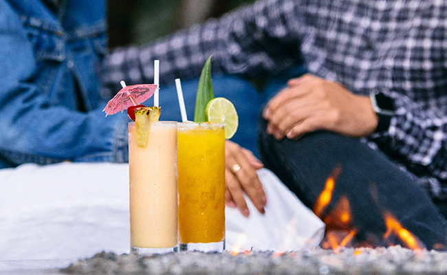 A couple enjoying cocktails at Moray's on their trip to San Diego