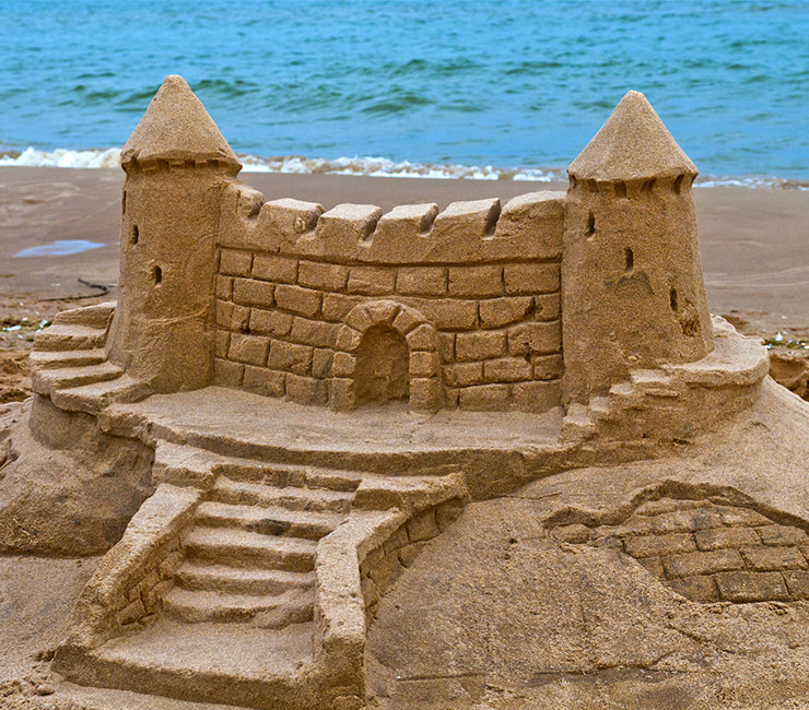 A sandcastle created by coworkers on the shores of Mission Bay at the Catamaran Resort Hotel in San Diego.