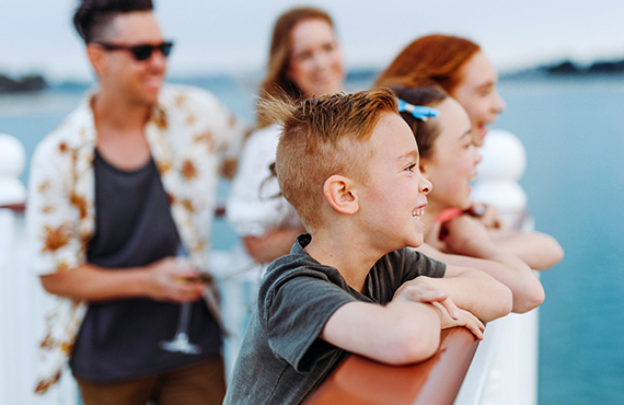 Family checks out the Mission Bay shoreline on the Bahia Belle