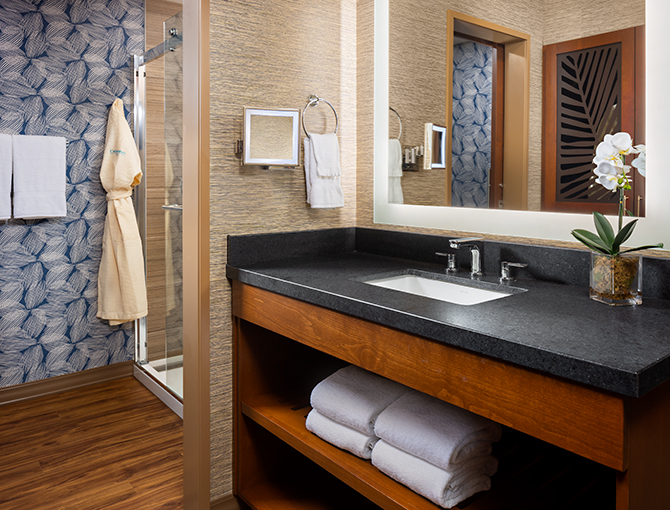 Bathroom dressing area with robes
