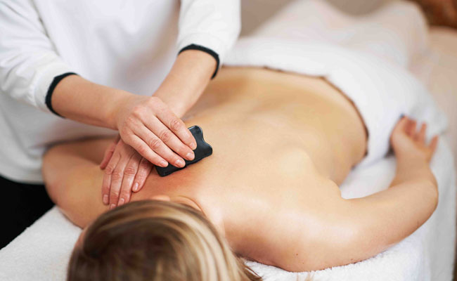 Woman getting a Magnesium Melt Massage at The Catamaran Spa in San Diego, CA