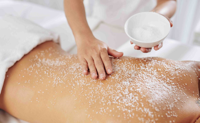 Guest getting a Ocean Detox Wrap at The Catamaran Spa in San Diego, CA