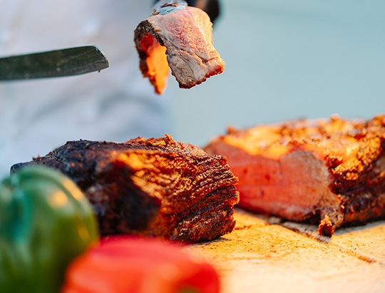 A carving station at a wedding at the Catamaran Resort Hotel.