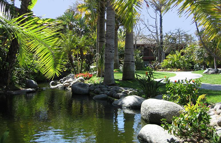 View of the garden and pond at the Catamaran Resort Hotel and Spa by Pacific Beach, San Diego, CA
