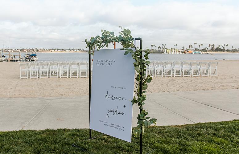 Signage welcoming guests for Jordan and Derrace’s wedding at the Catamaran Resort Hotel.